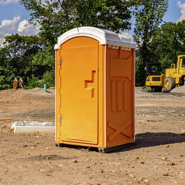 how often are the porta potties cleaned and serviced during a rental period in Janesville